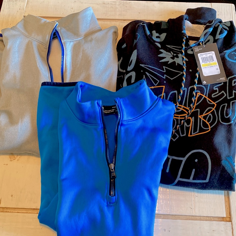 Medium youth boys under armour gently worn pullovers and never worn hoodie.